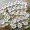 12 Pack: Crystal AB Faceted Glass Round Beads, 10mm by Bead Landing™
